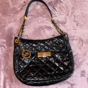 Michael Kors black leather purse with gold chain